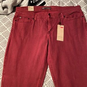 Skinny Low waisted maroon Levi pants.